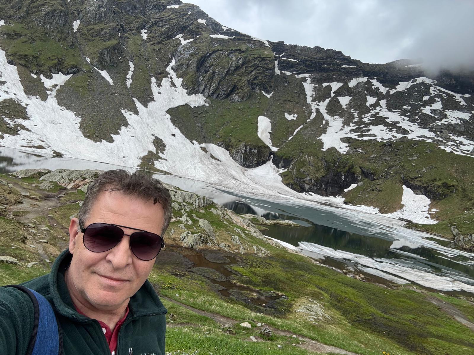 Photo of lead author Gelu Costin with Carpathian Mountains in the background