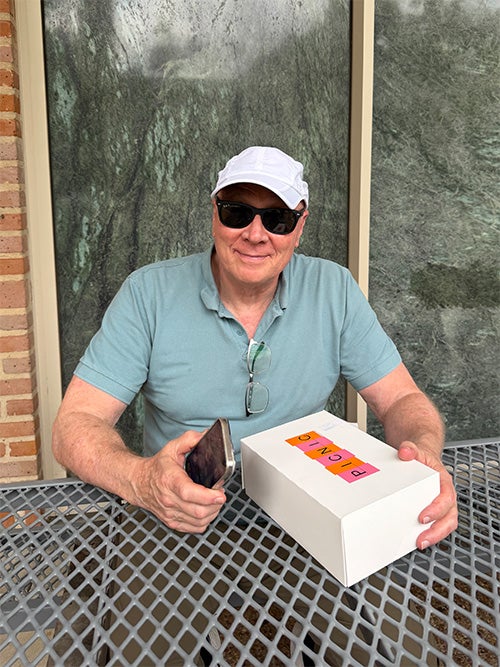 Photo of Alan Levander eating lunch on EEPS patio