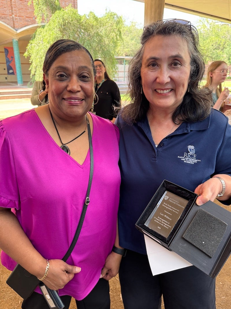 Image of long-time EEPS staff member Denise Mayberry with Lee Willson
