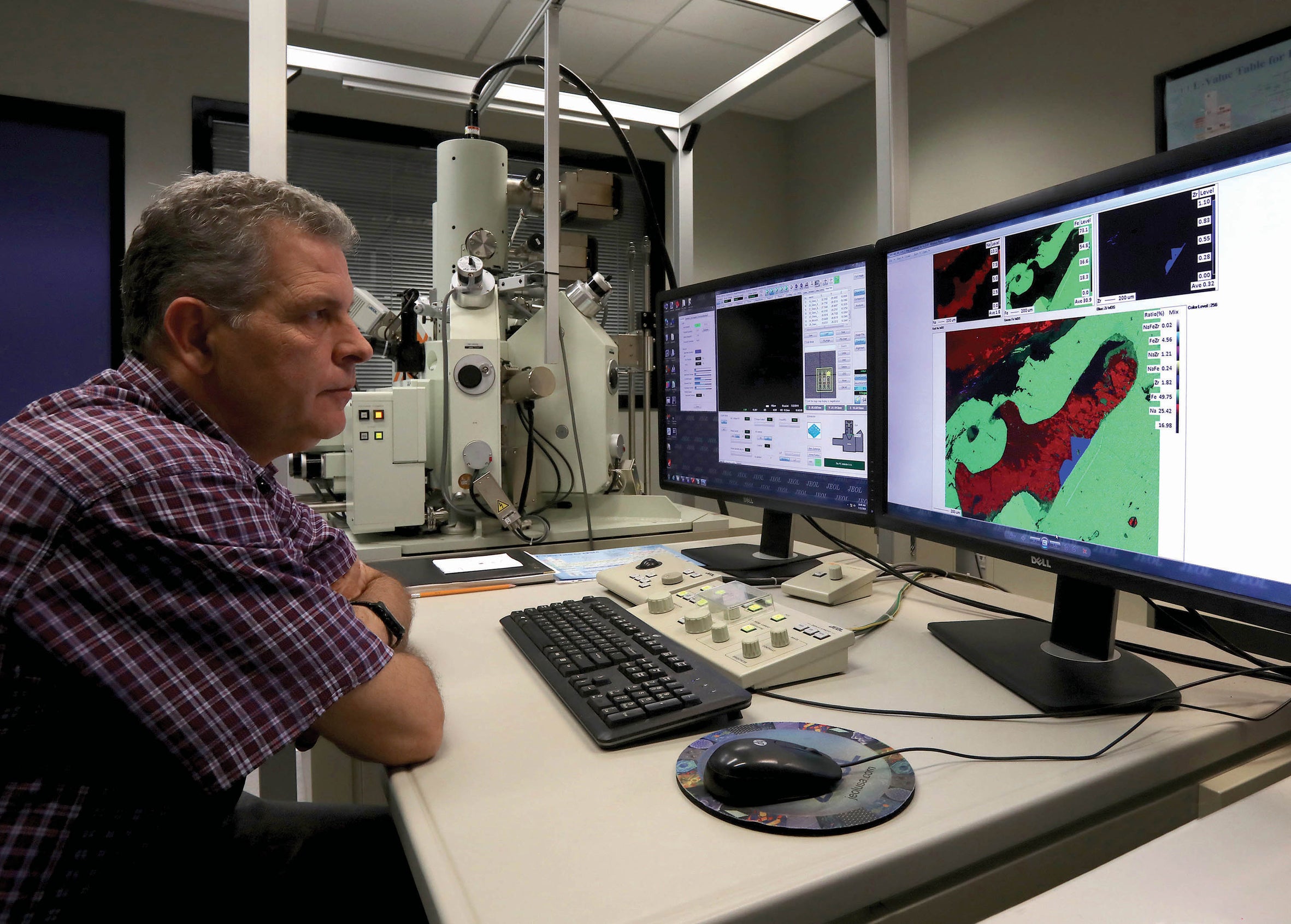 Gelu Costin at monitor of Electron Microprobe Analyzer