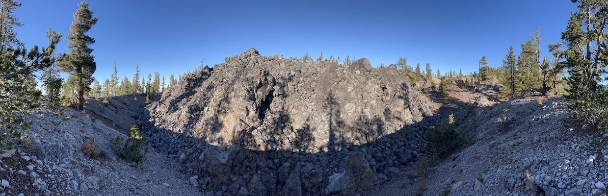 Figure 14: Rhyolitic dome northwest of the Big Glass Mountain lava flow, surrounded by a tephra cone made up of coarse pumice fragments.