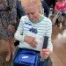 Martha Lou Broussard looks at her Distinguished Alumni award